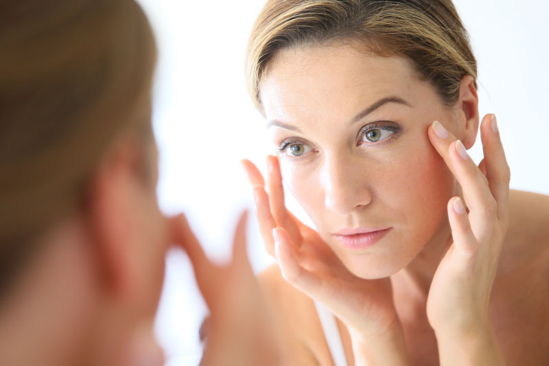 facial aesthetics patient smiling after botox procedure